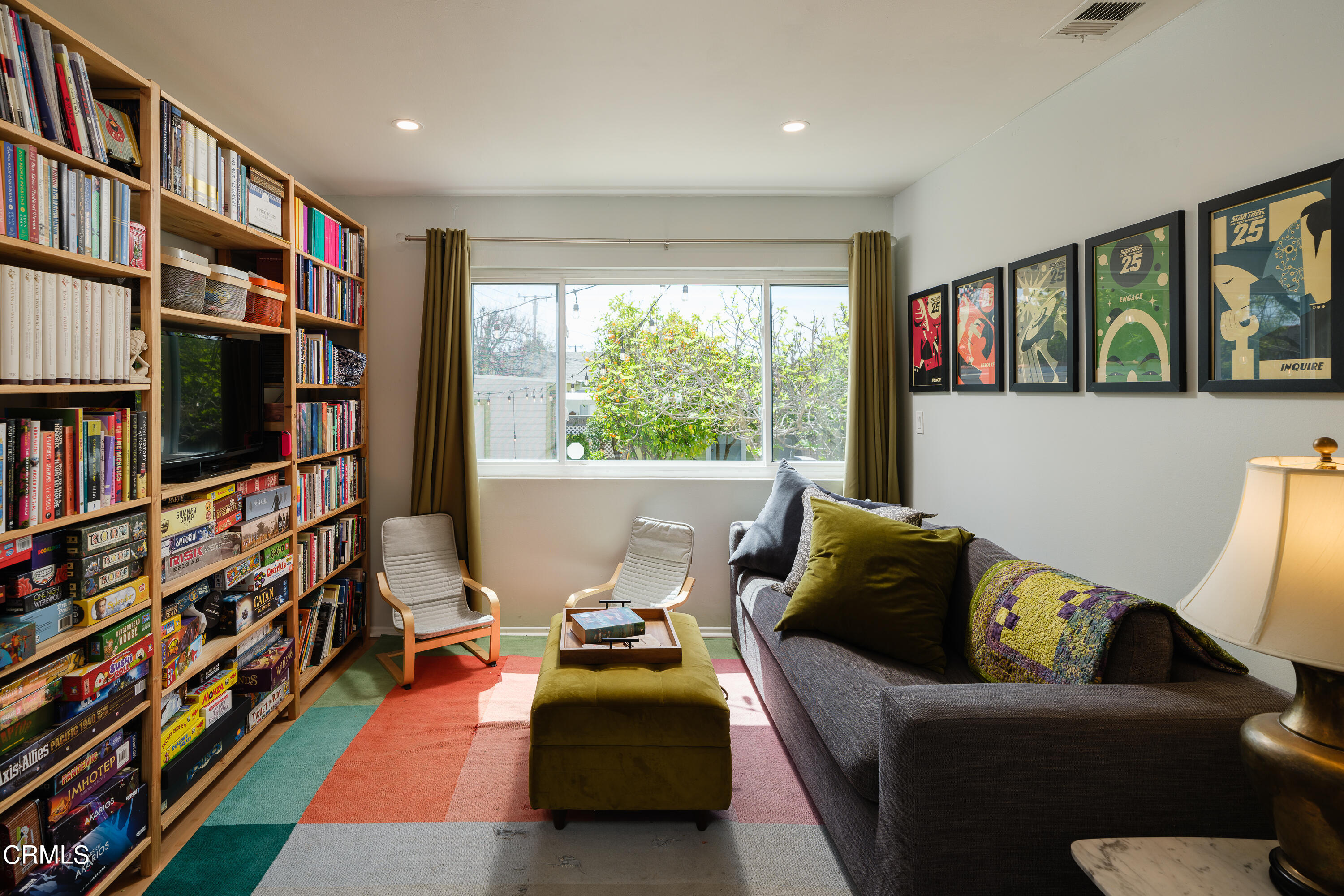 1794 Beverly Drive Pasadena, CA 91104 - Photo 26 of 56 a living room with furniture and a book shelf