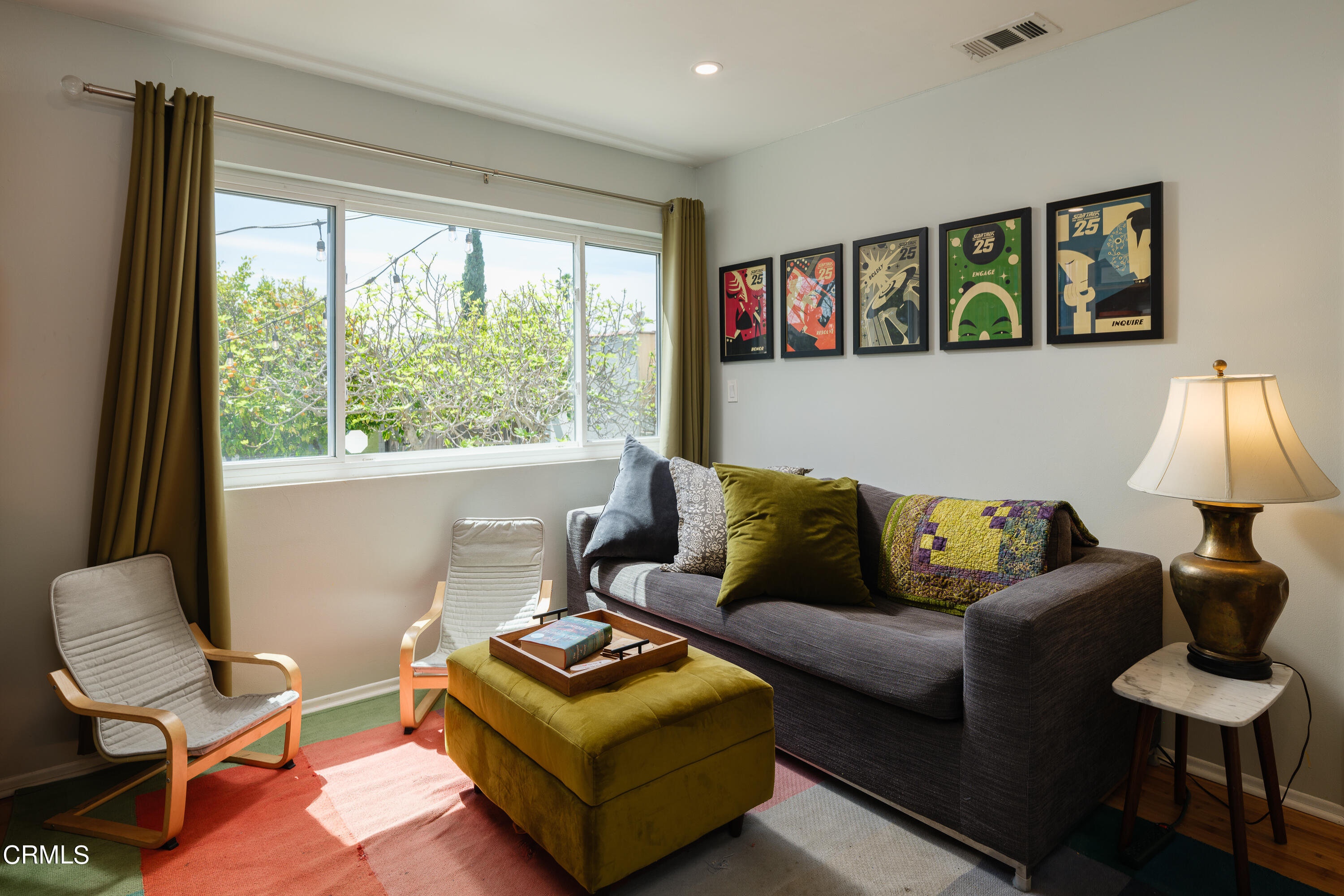 1794 Beverly Drive Pasadena, CA 91104 - Photo 27 of 56 a living room with furniture and a window