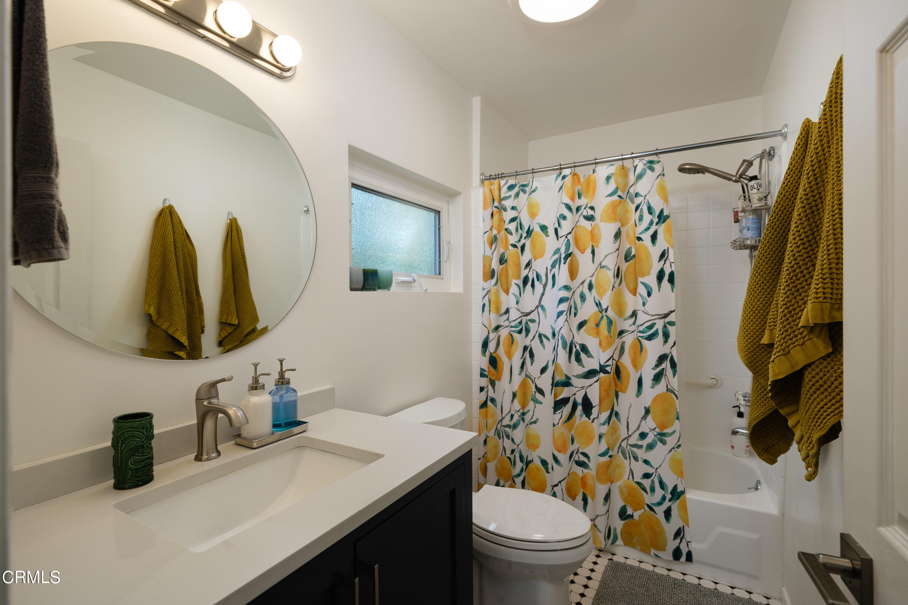 1794 Beverly Drive Pasadena, CA 91104 - Photo 28 of 56 a bathroom with a granite countertop sink and a mirror