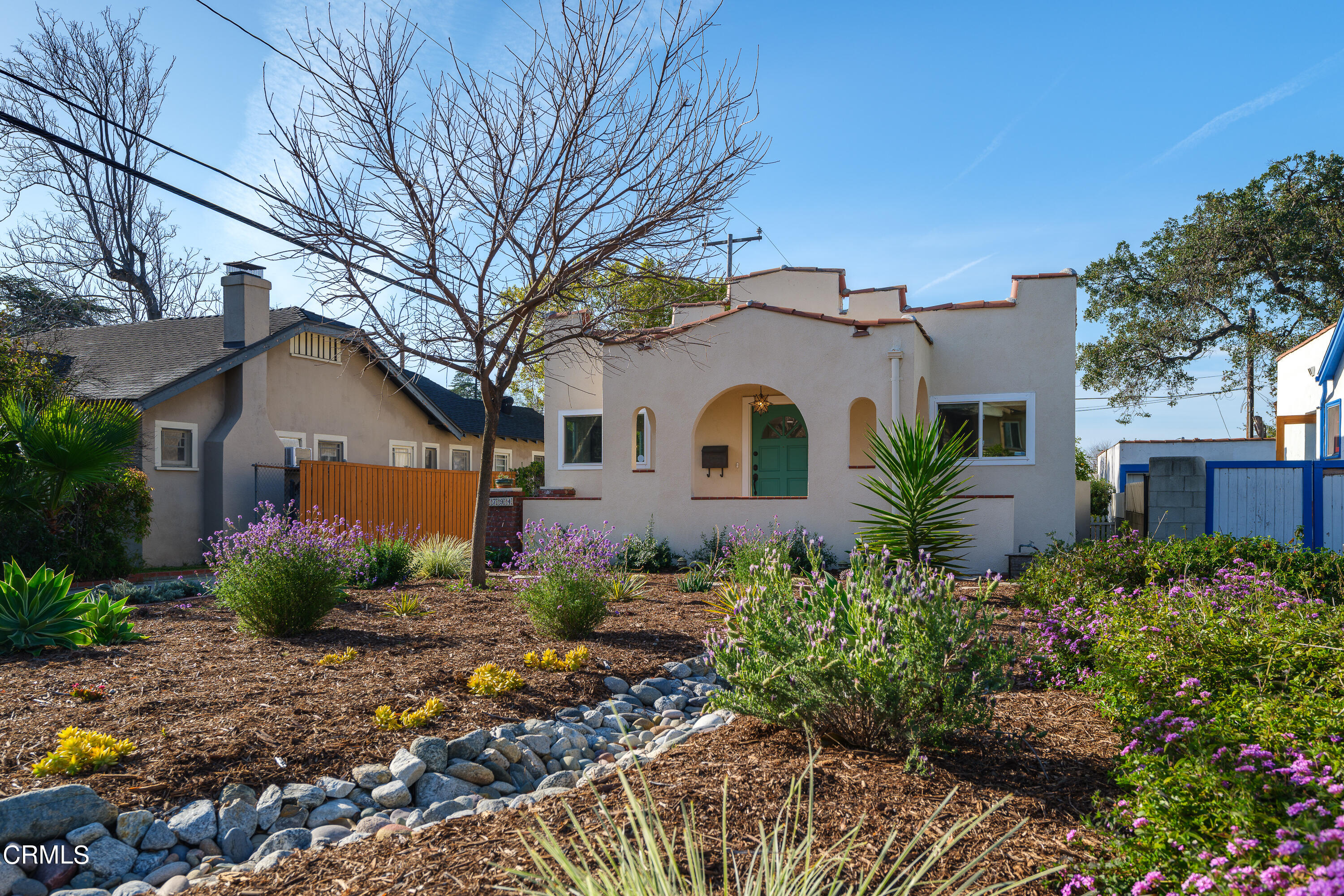 1794 Beverly Drive Pasadena, CA 91104 - Photo 3 of 56 a front view of a house with garden