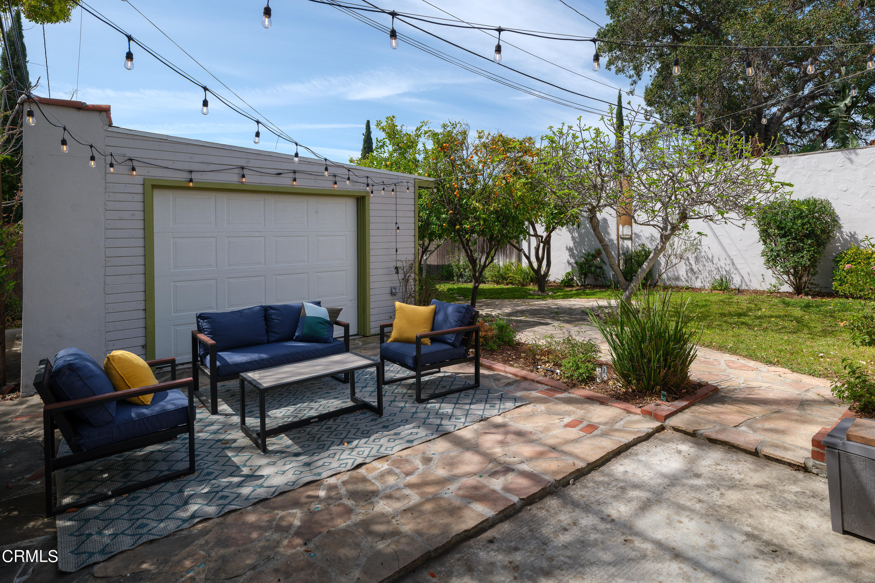 1794 Beverly Drive Pasadena, CA 91104 - Photo 31 of 56 a view of a bench in back yard of a house