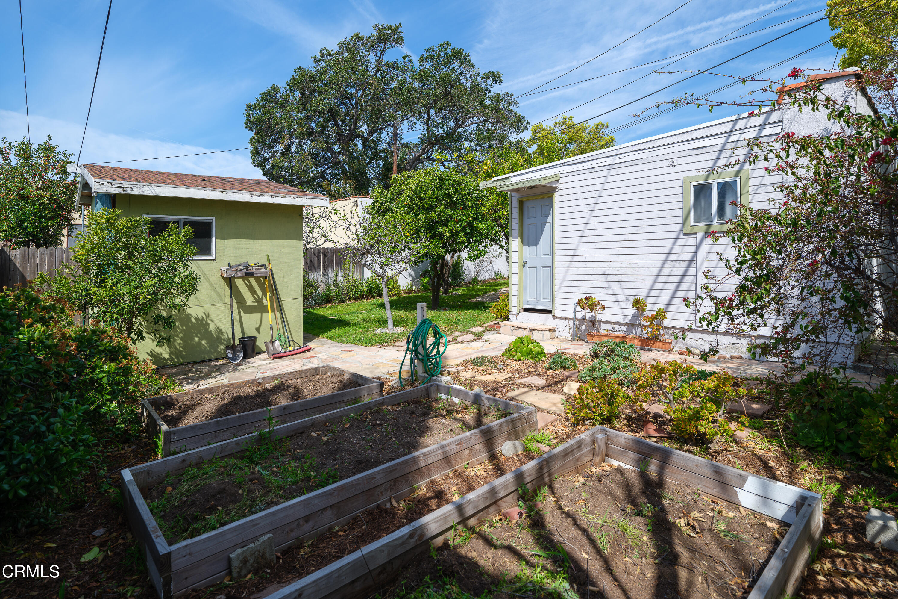 1794 Beverly Drive Pasadena, CA 91104 - Photo 39 of 56 a backyard of a house with yard and outdoor seating