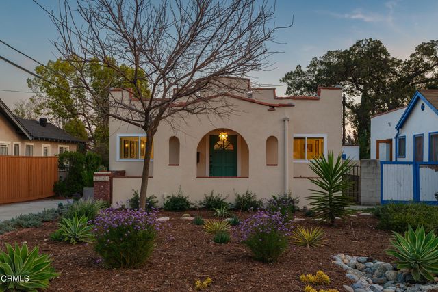 a outdoor living space with patio furniture and a potted plant
