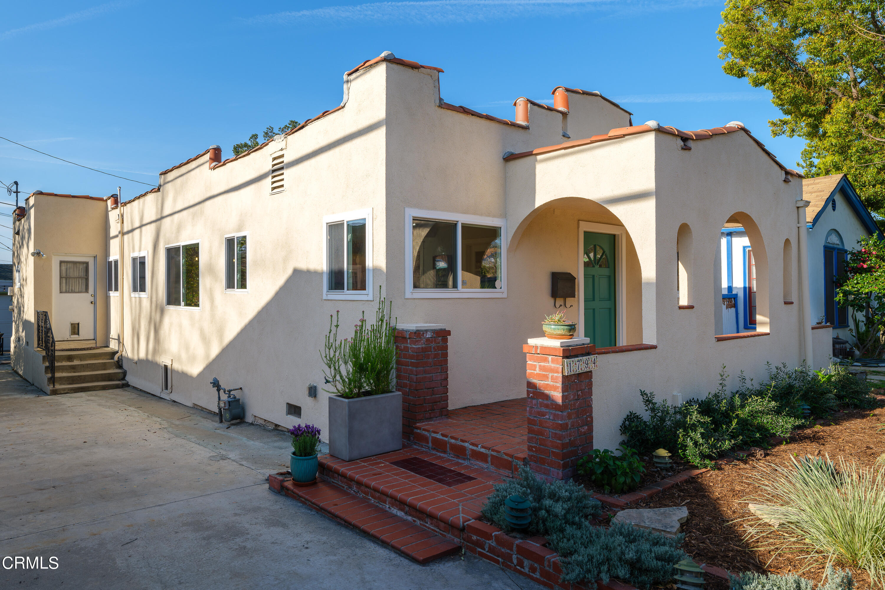 1794 Beverly Drive Pasadena, CA 91104 - Photo 5 of 56 a front view of a house with garden