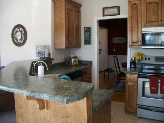 738 Old Seminary Road Manchester, TN 37355 - Photo 9 of 19 Kitchen with stainless appliances and tile floors