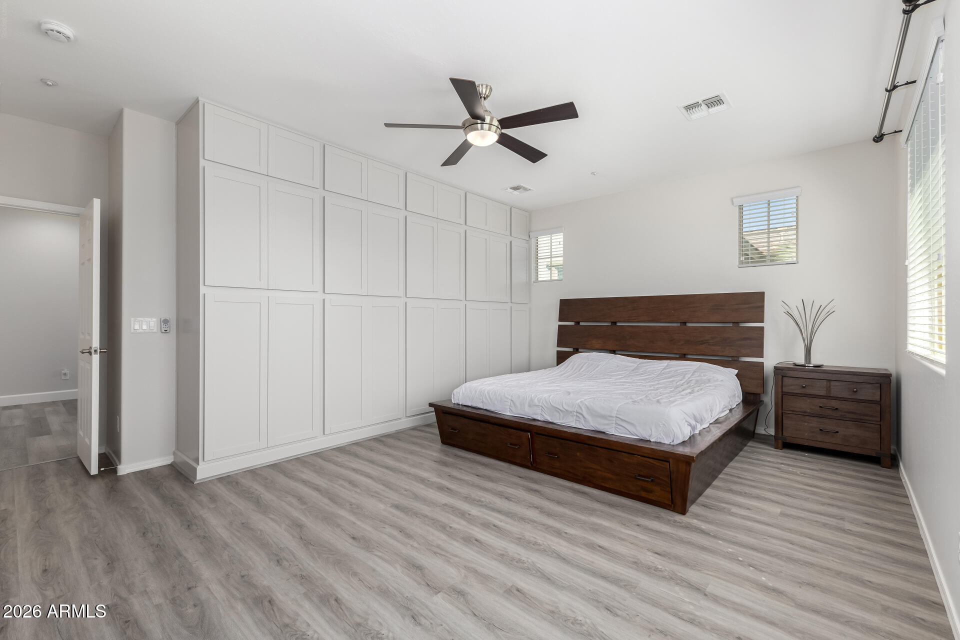 3469 East Indigo Street Gilbert, AZ 85298 - Photo 14 of 32 a bedroom with a bed and window