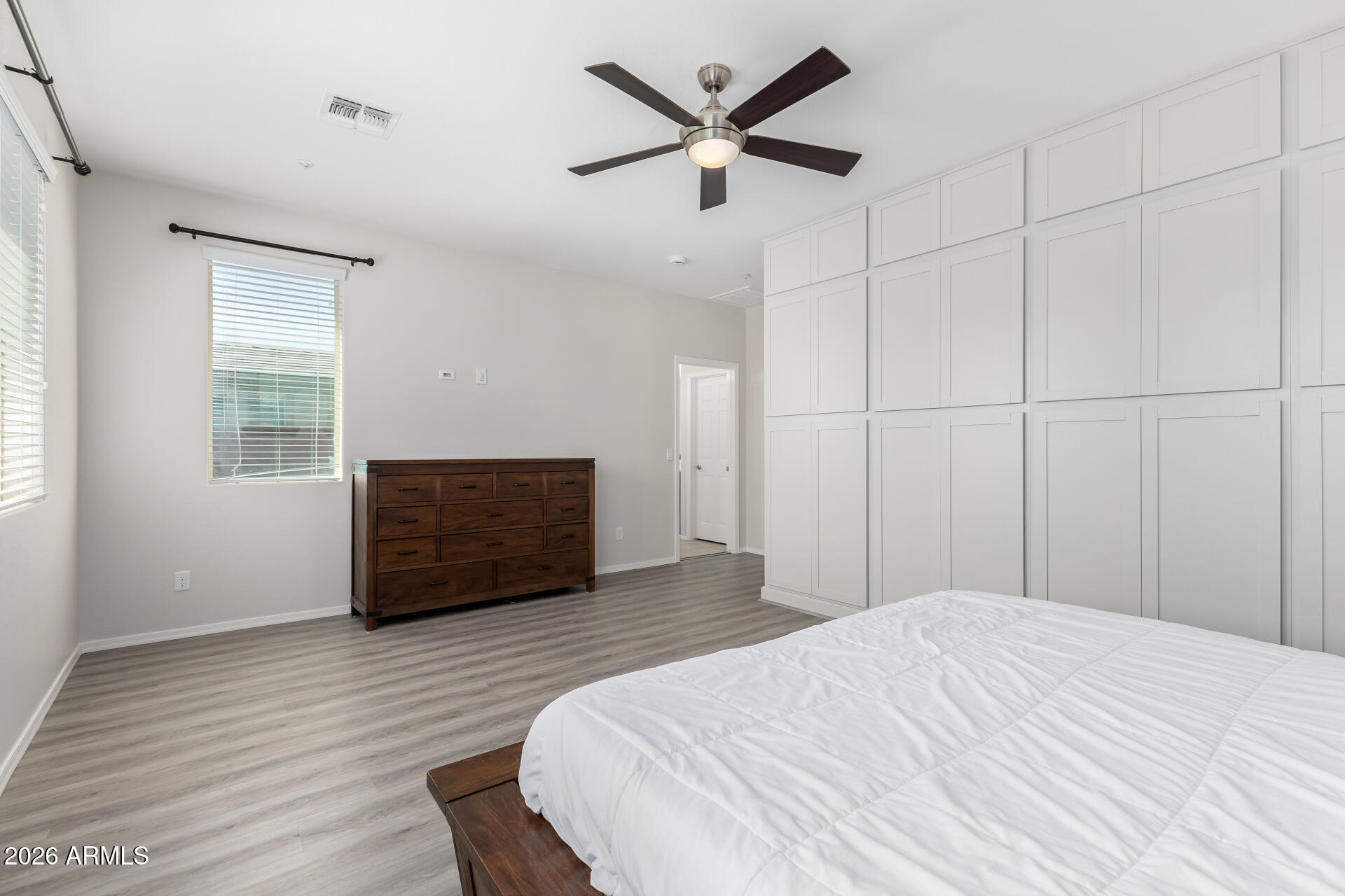 3469 East Indigo Street Gilbert, AZ 85298 - Photo 15 of 32 a bedroom with a bed and a window