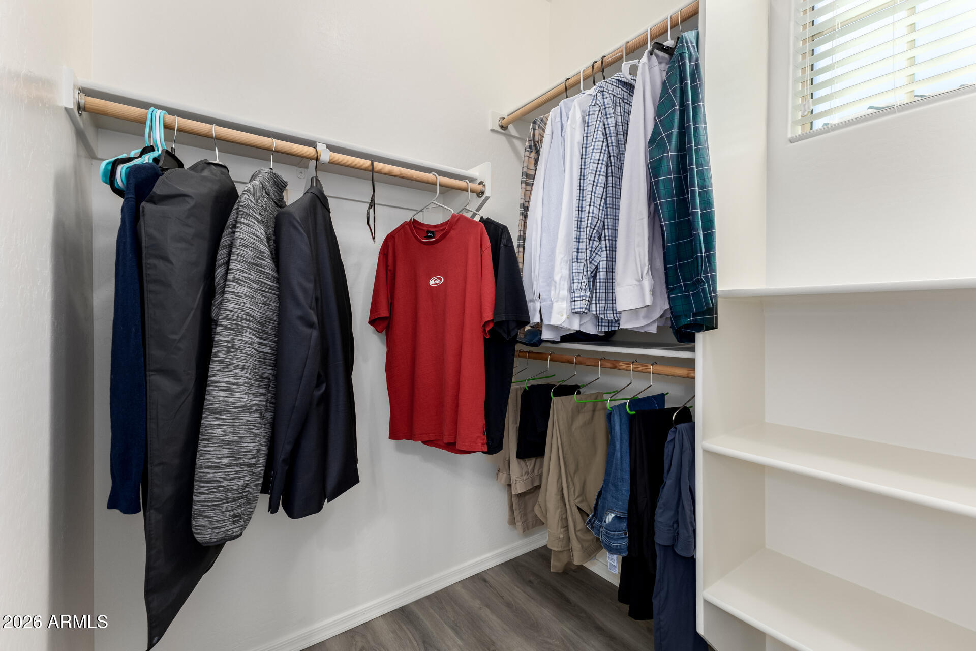 3469 East Indigo Street Gilbert, AZ 85298 - Photo 18 of 32 a view of a walk in closet