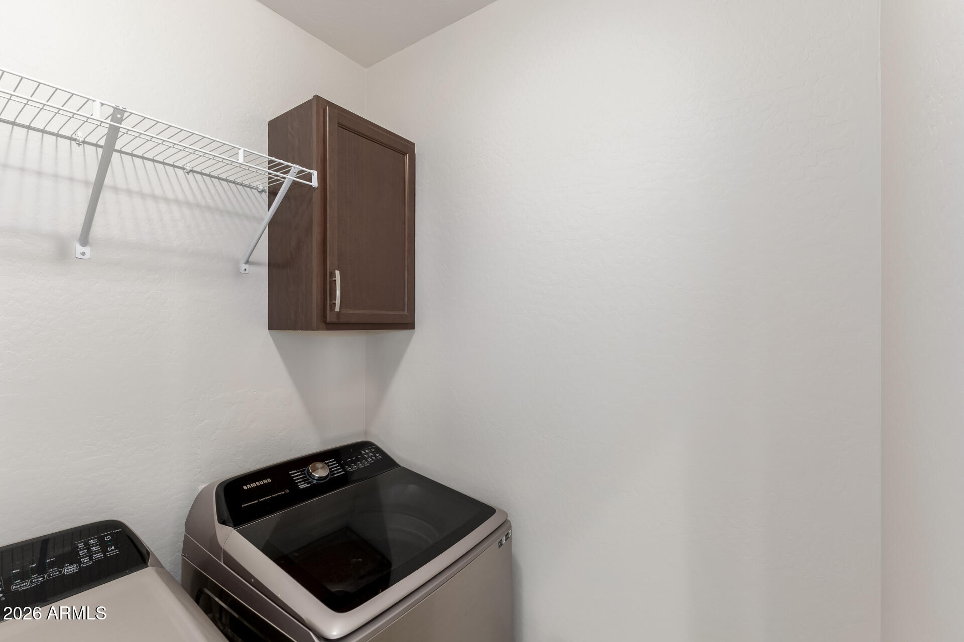 3469 East Indigo Street Gilbert, AZ 85298 - Photo 27 of 32 a utility room with dryer and washer
