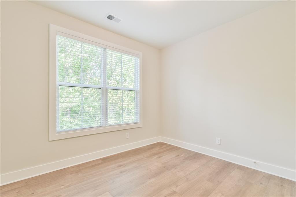 235 Firefly Circle Alpharetta, GA 30009 - Photo 15 of 30 an empty room with a window
