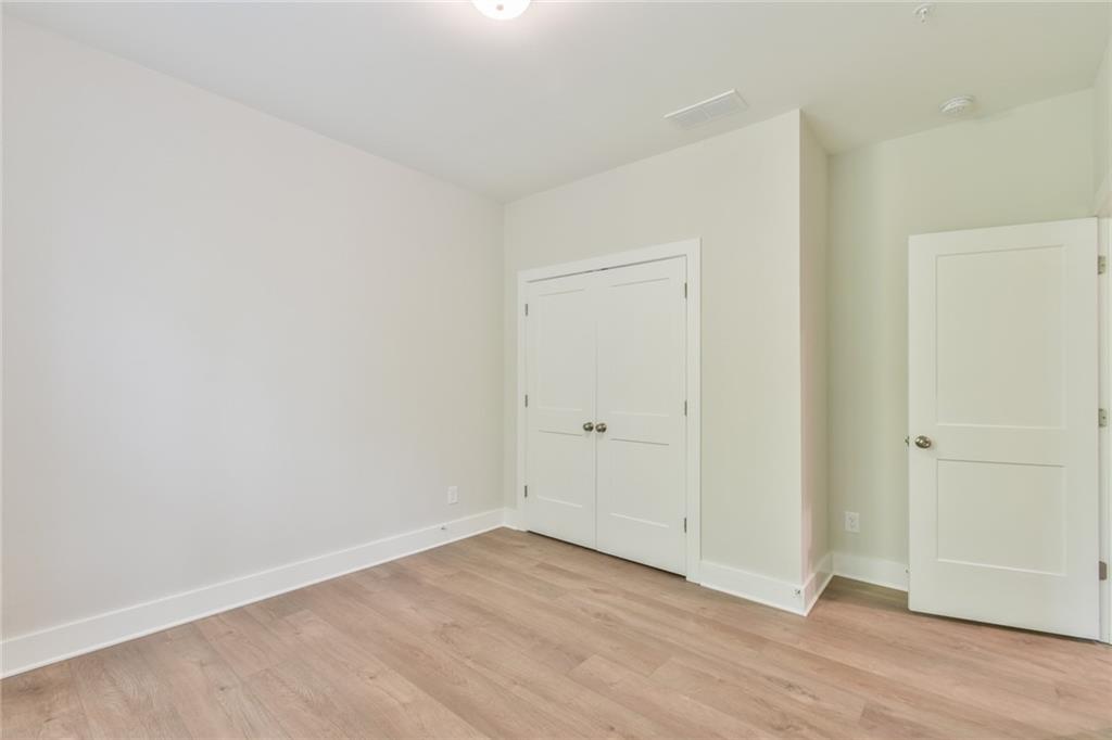 235 Firefly Circle Alpharetta, GA 30009 - Photo 19 of 30 a view of an empty room