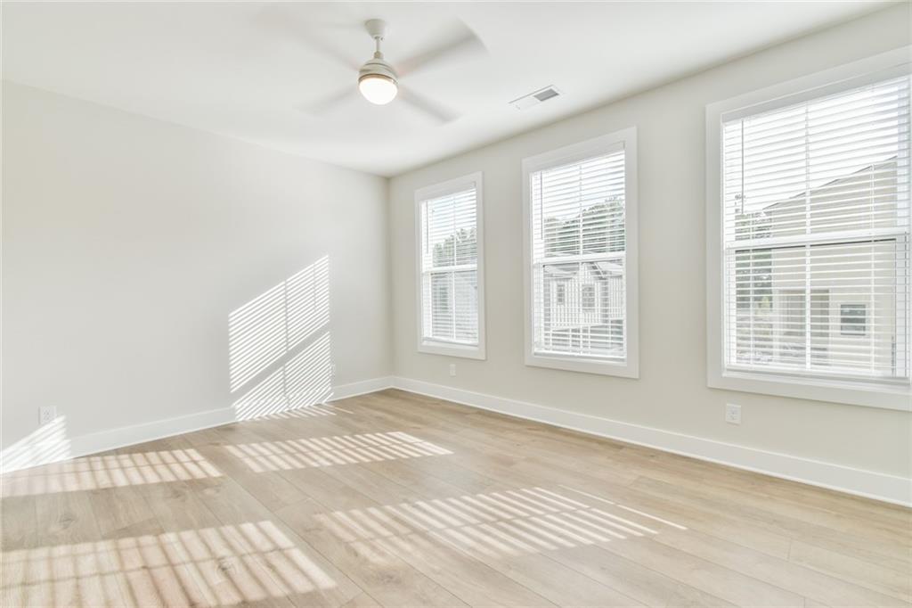 235 Firefly Circle Alpharetta, GA 30009 - Photo 23 of 30 a view of an empty room with a window