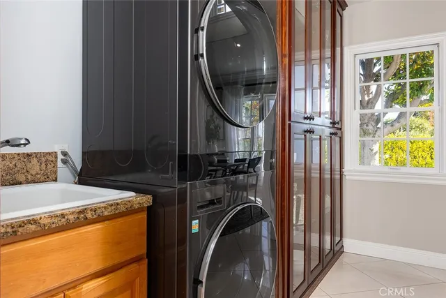 a view of a hallway with washer and dryer