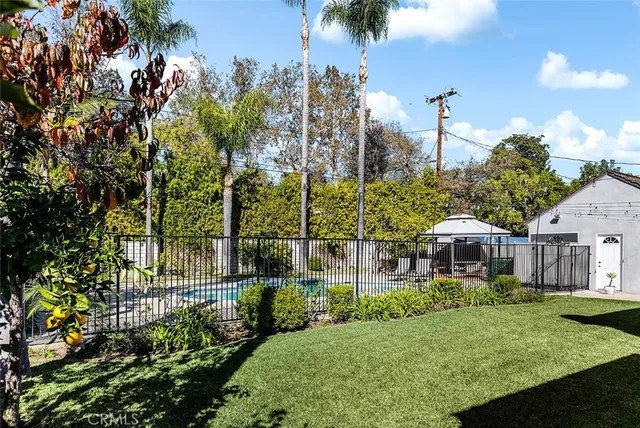 a front view of a building with garden