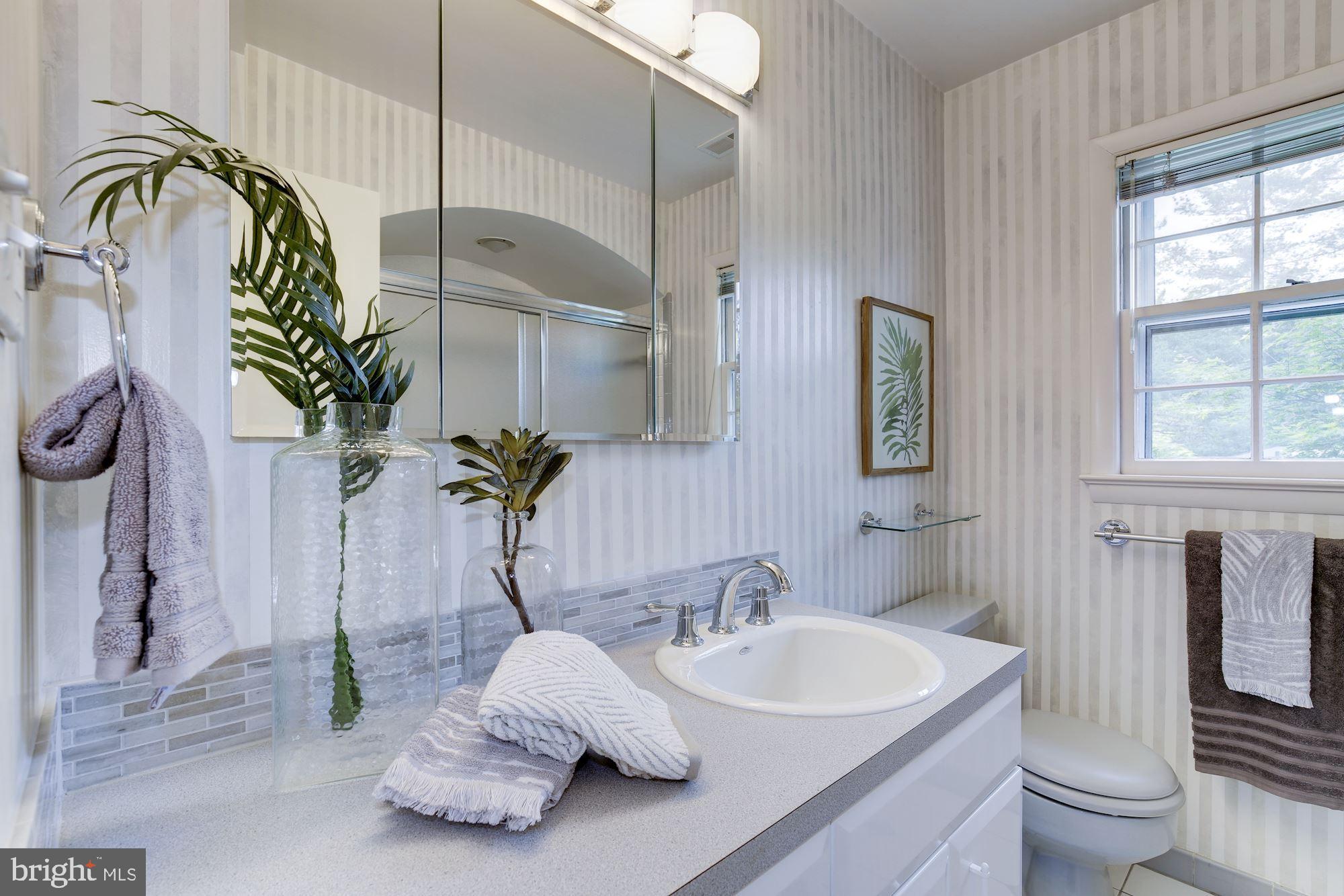 5508 Devon Road Bethesda, MD 20814 - Photo 20 of 41 Shared full bath with glass doored tub (not shown)