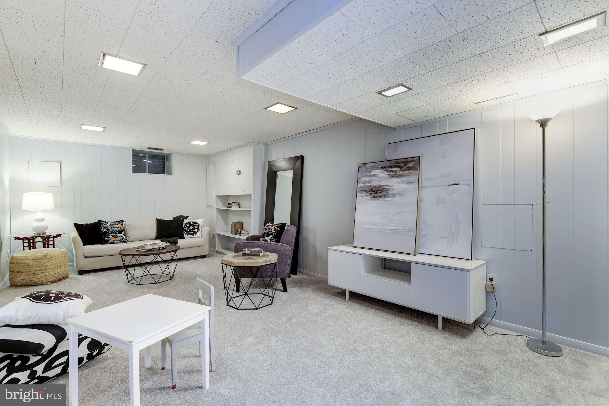 5508 Devon Road Bethesda, MD 20814 - Photo 27 of 41 Full basement recreation room + storage & laundry