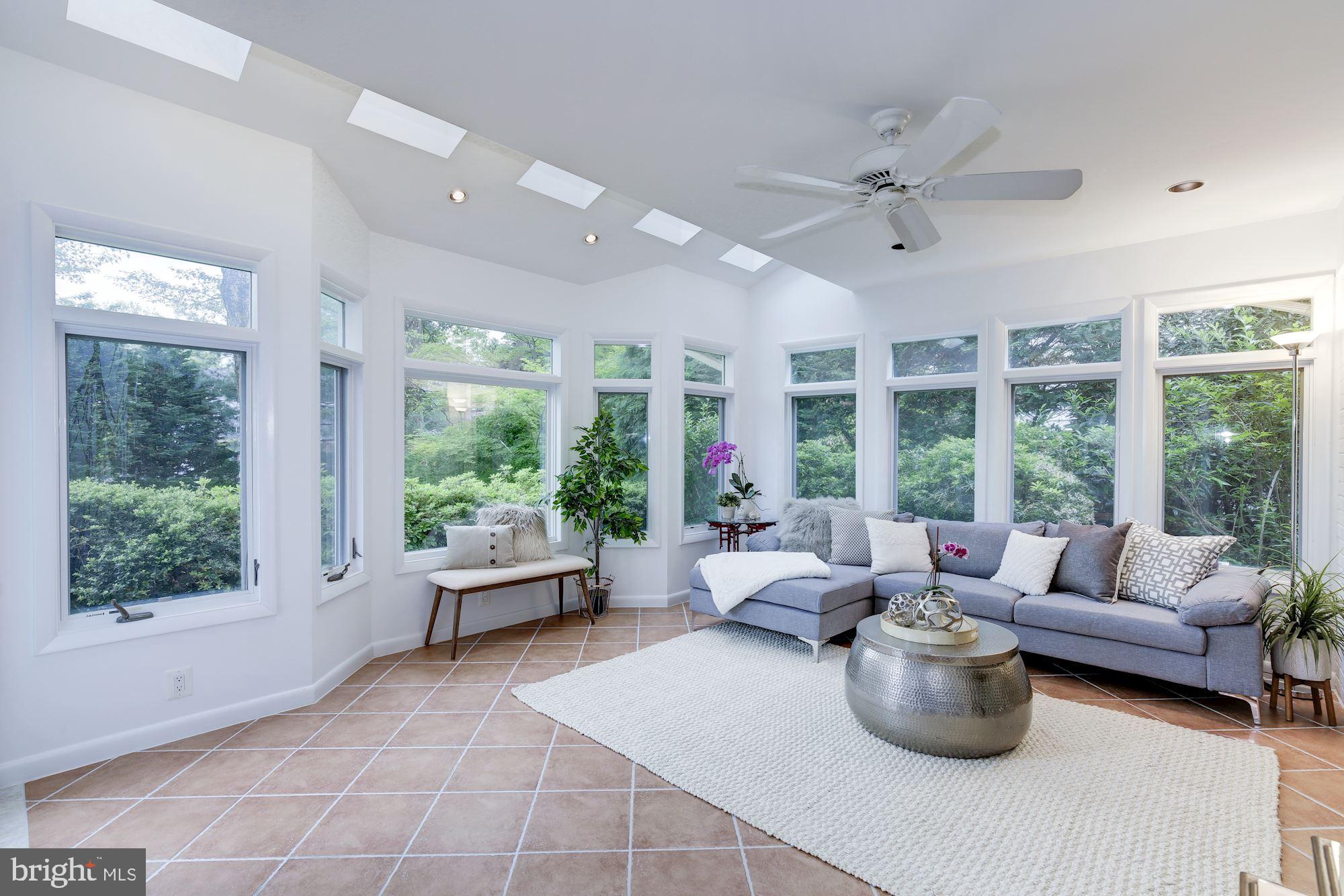5508 Devon Road Bethesda, MD 20814 - Photo 6 of 41 Sunroom overlooks blooming yard and private pool