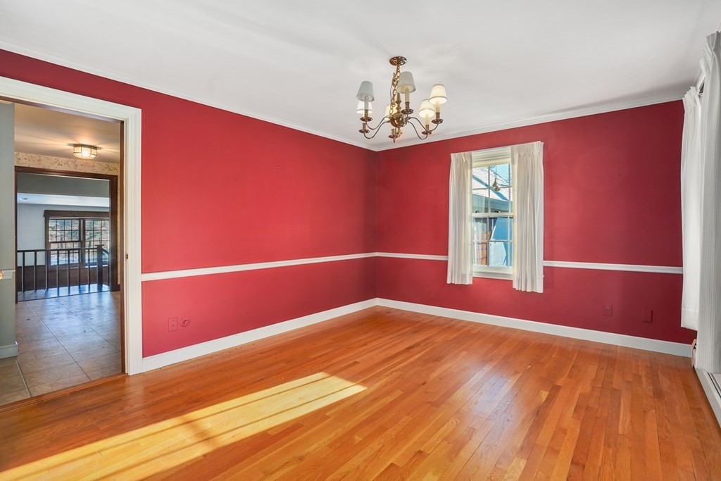 61 Walnut Street Shrewsbury, MA 01545 - Photo 12 of 38 a view of empty room with wooden floor and fan