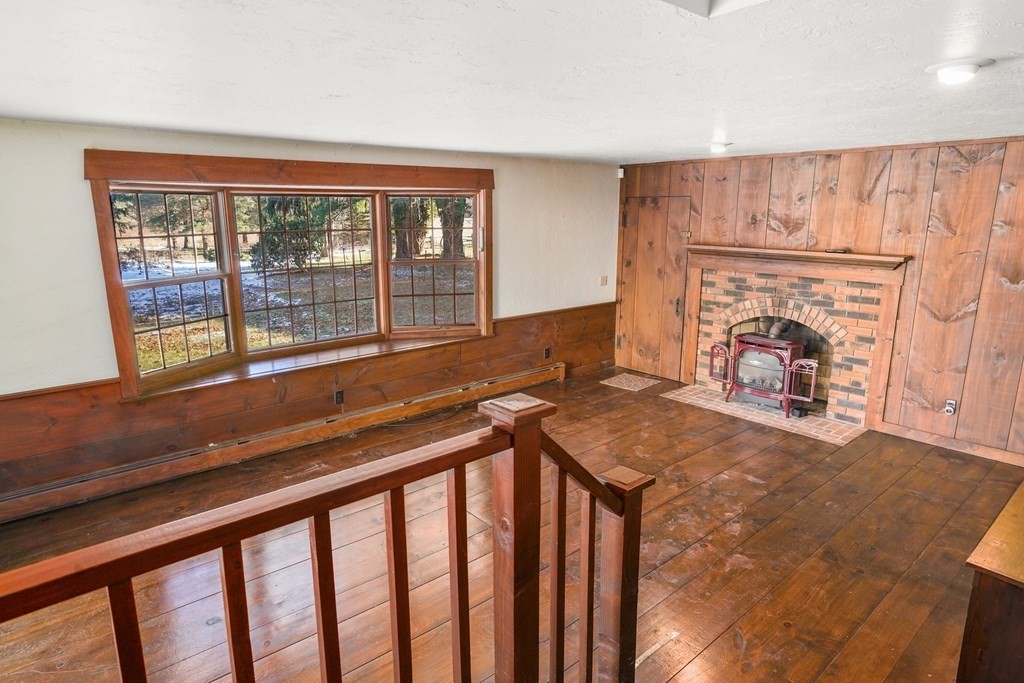 61 Walnut Street Shrewsbury, MA 01545 - Photo 13 of 38 a view of a living room and a fireplace
