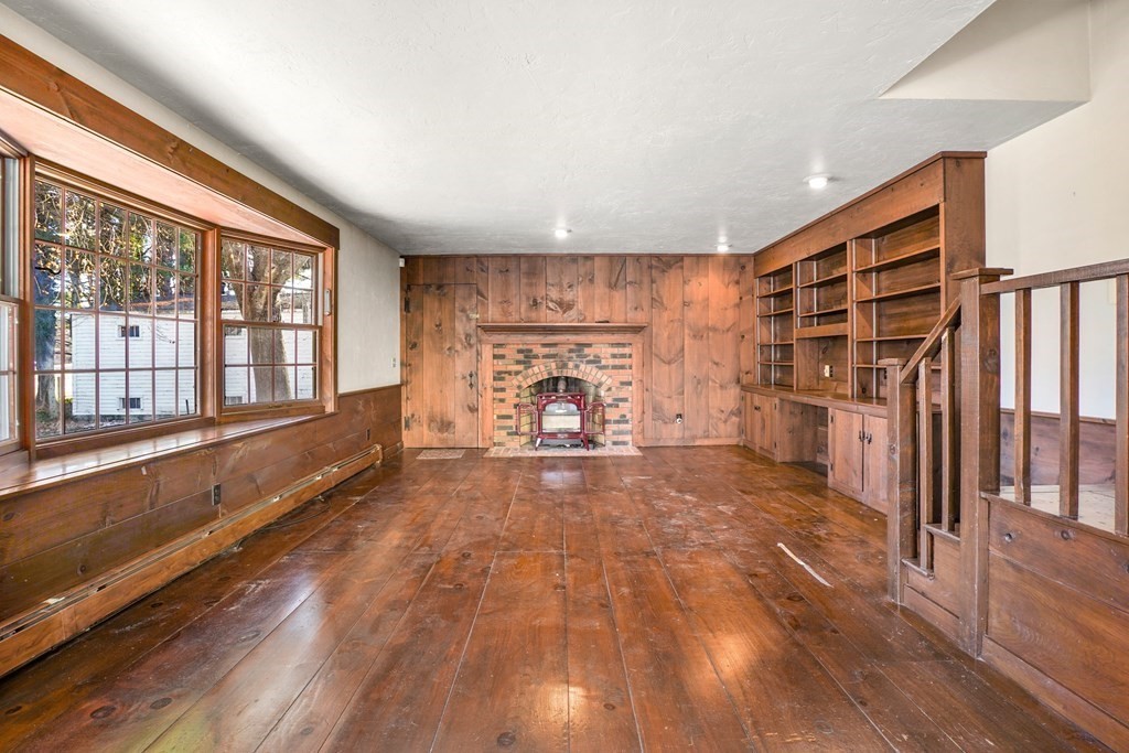 61 Walnut Street Shrewsbury, MA 01545 - Photo 14 of 38 a view of an empty room with wooden floor and a window
