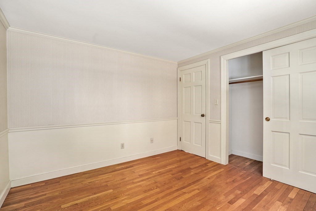 61 Walnut Street Shrewsbury, MA 01545 - Photo 23 of 38 a view of empty room with wooden floor