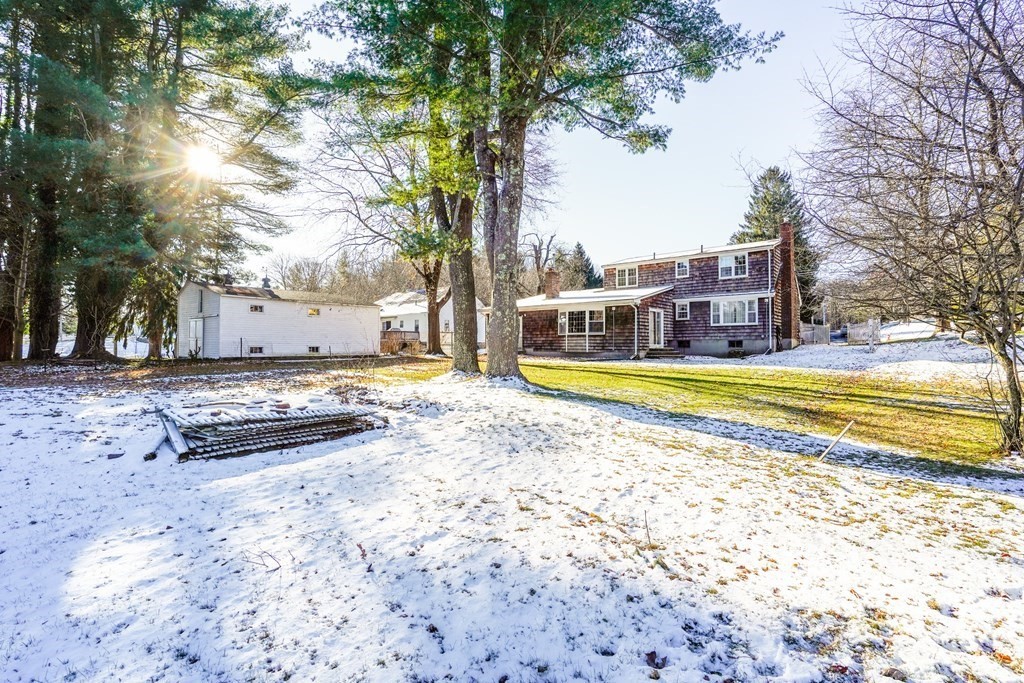 61 Walnut Street Shrewsbury, MA 01545 - Photo 35 of 38 a view of a swimming pool with a lounge chairs