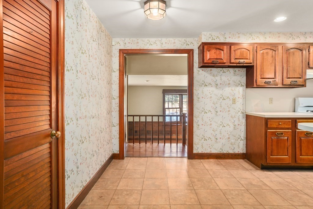 61 Walnut Street Shrewsbury, MA 01545 - Photo 6 of 38 a view of a hallway with front door
