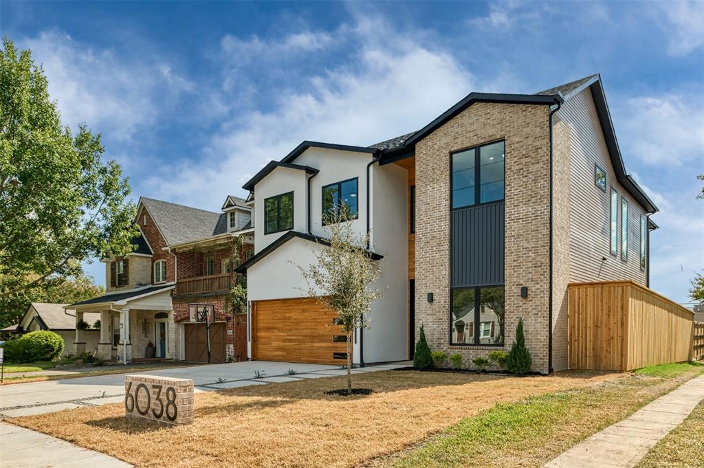 6038 Prospect Avenue Dallas, TX 75206 - Photo 2 of 40 a front view of a house with a pathway