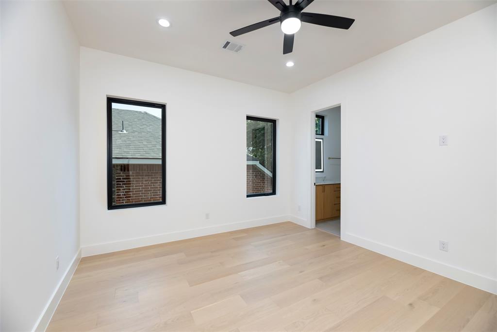 6038 Prospect Avenue Dallas, TX 75206 - Photo 28 of 40 an empty room with fan and windows