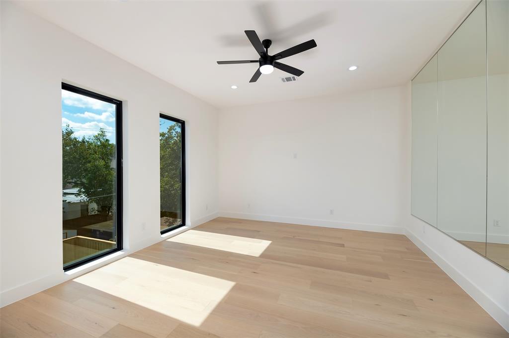 6038 Prospect Avenue Dallas, TX 75206 - Photo 31 of 40 a view of a livingroom with a ceiling fan and window