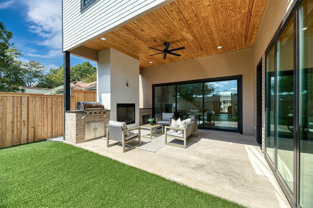 6038 Prospect Avenue Dallas, TX 75206 - Photo 36 of 40 a view of a patio with a table chairs and backyard