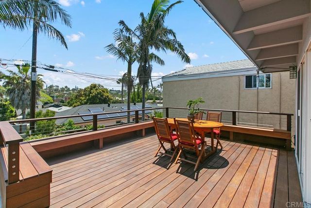 a view of outdoor sitting area with furniture