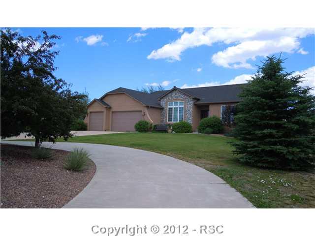 1075 Bowstring Road Monument, CO 80132 - Photo 1 of 16 Circular drive!