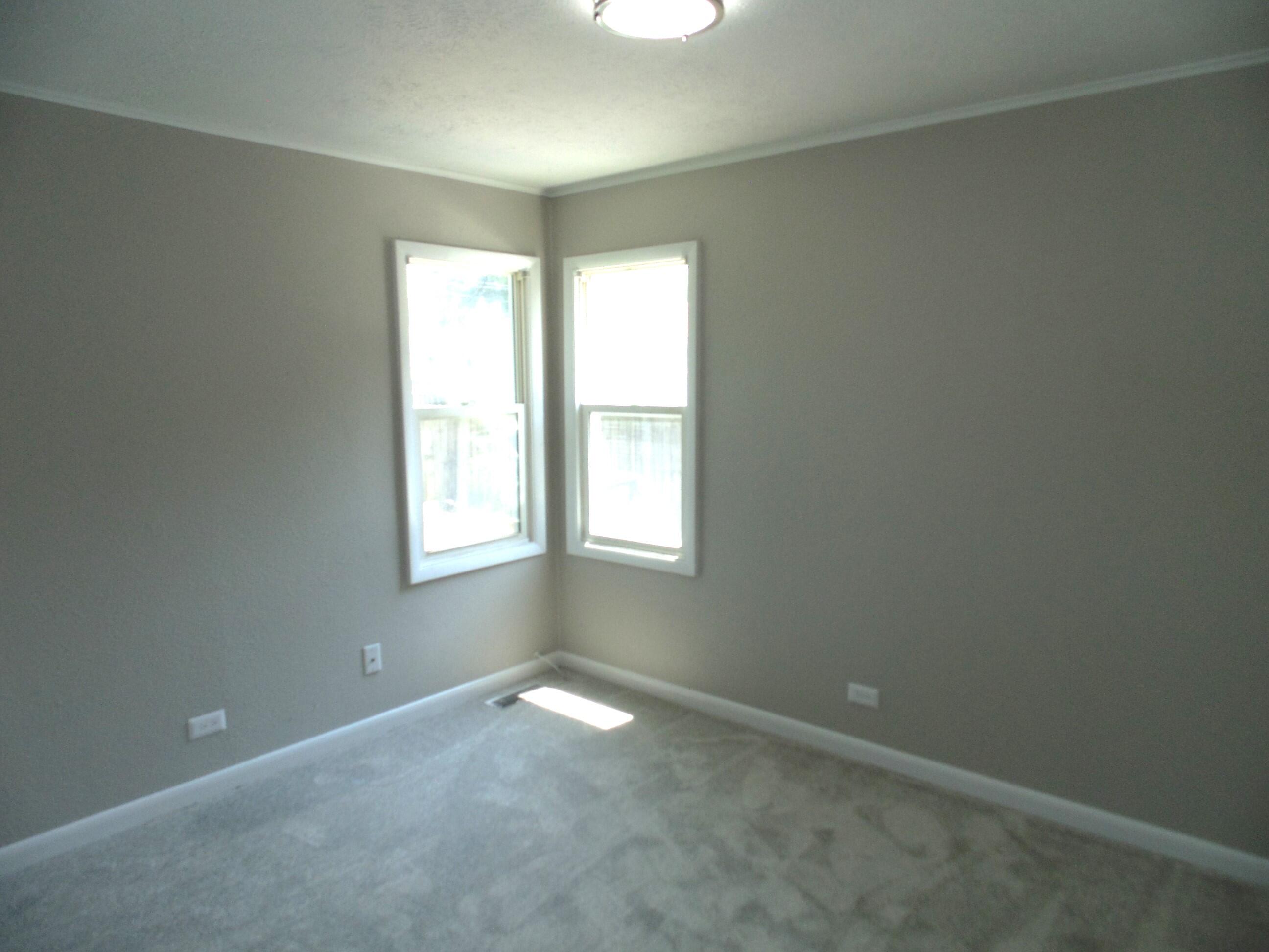 2919 State Street Lake Station, IN 46405 - Photo 14 of 28 an empty room with a window