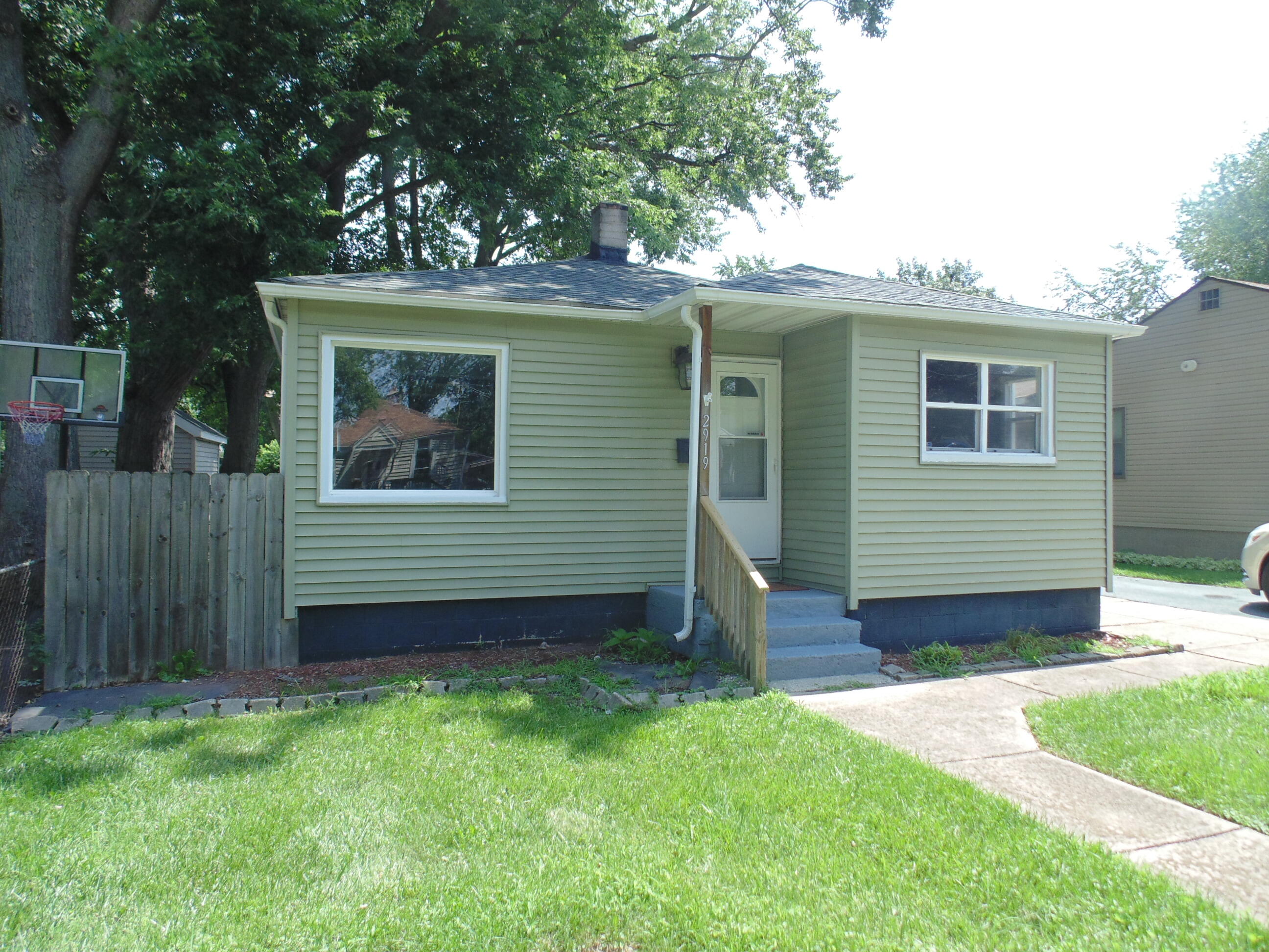 2919 State Street Lake Station, IN 46405 - Photo 2 of 28 a view of a house with a yard