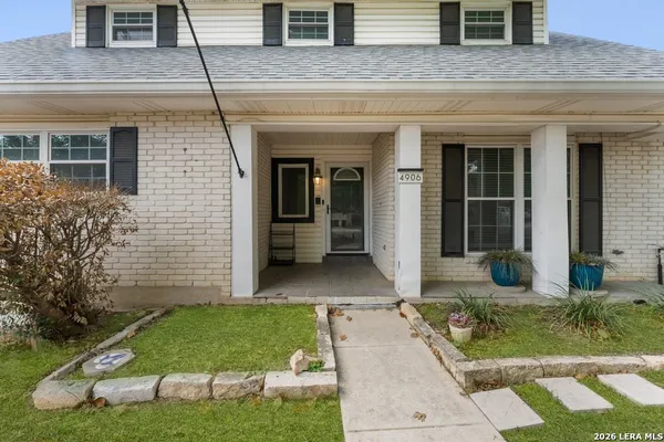 a front view of house with yard