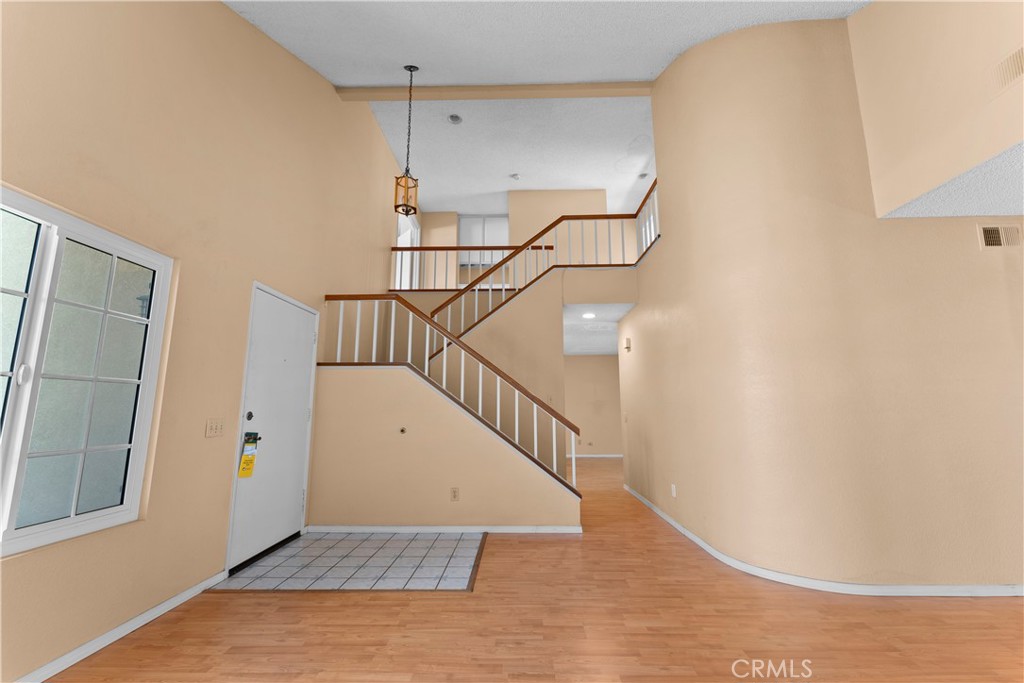 703 Pinto Circle Walnut, CA 91789 - Photo 12 of 54 a view of entryway and hall with wooden floor