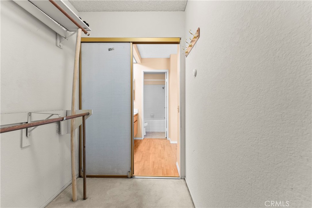 703 Pinto Circle Walnut, CA 91789 - Photo 28 of 54 a bathroom with a glass shower door