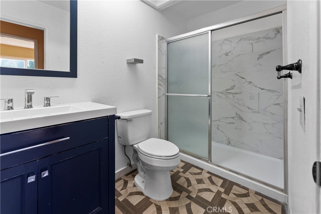 703 Pinto Circle Walnut, CA 91789 - Photo 35 of 54 a bathroom with a sink toilet and shower