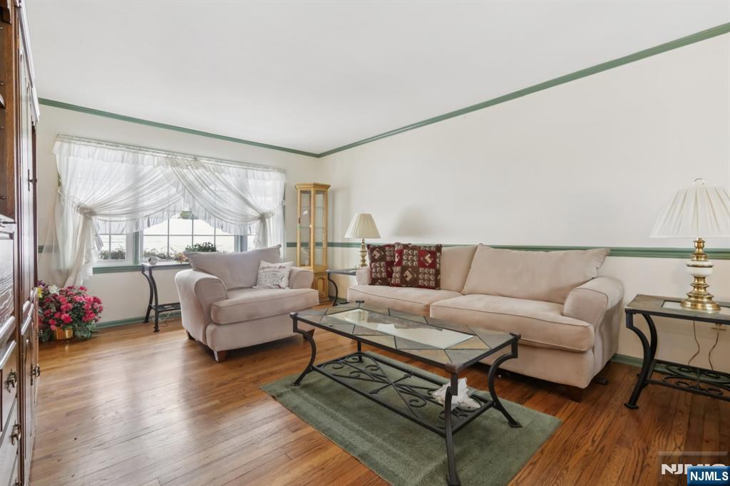 29 Joyce Drive Roxbury Township, NJ 07876 - Photo 14 of 31 a living room with furniture and a large window