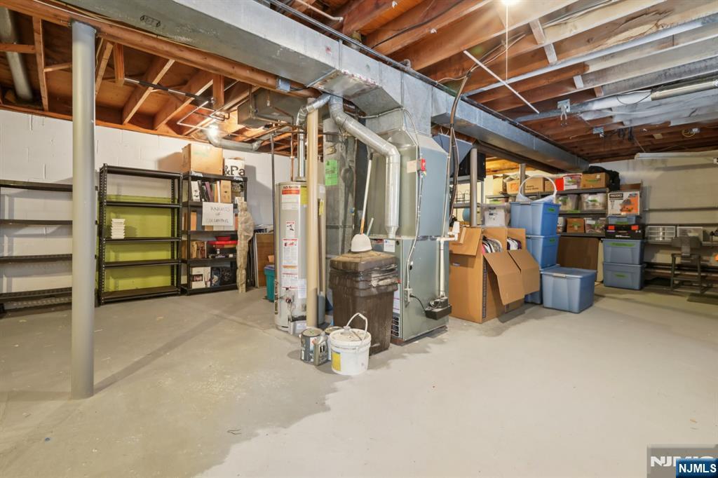 29 Joyce Drive Roxbury Township, NJ 07876 - Photo 23 of 31 a view of a garage with storage