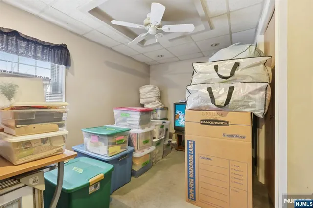 a bathroom with a sink a mirror and a shower