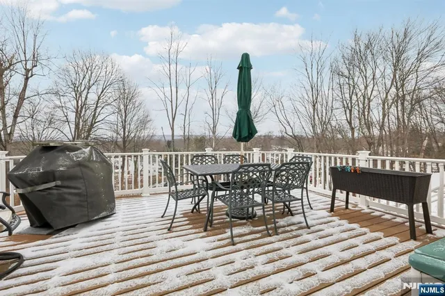 a view of a terrace with a barbeque