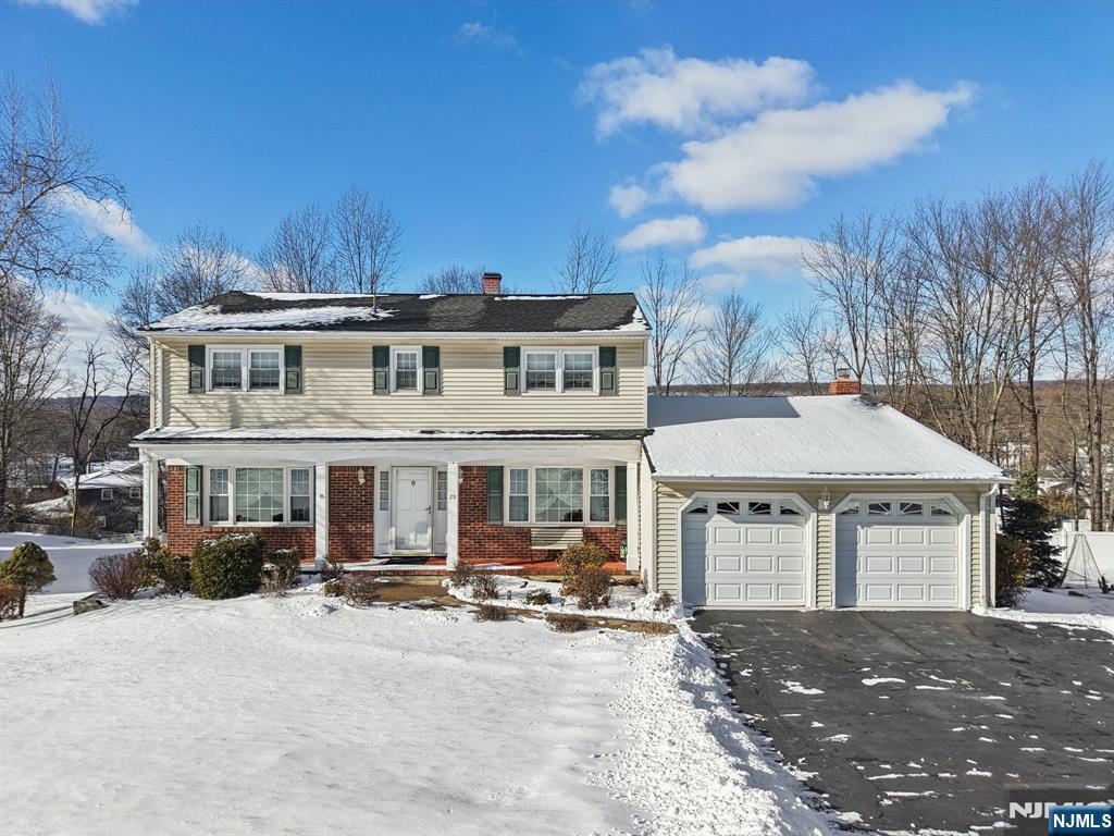 29 Joyce Drive Roxbury Township, NJ 07876 - Photo 29 of 31 a front view of a house with yard and lake view