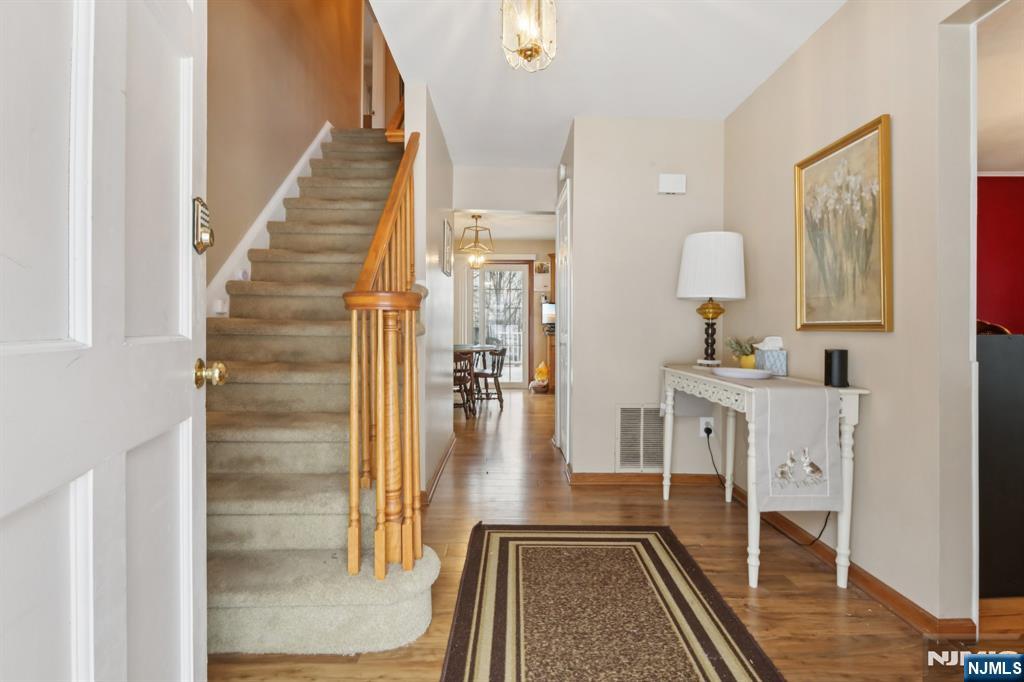 29 Joyce Drive Roxbury Township, NJ 07876 - Photo 5 of 31 a spacious bathroom with a shower a sink and a mirror