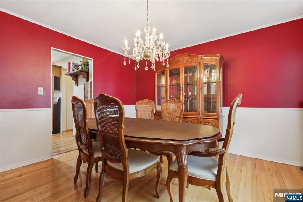 29 Joyce Drive Roxbury Township, NJ 07876 - Photo 7 of 31 a view of a dining room with furniture and chandelier