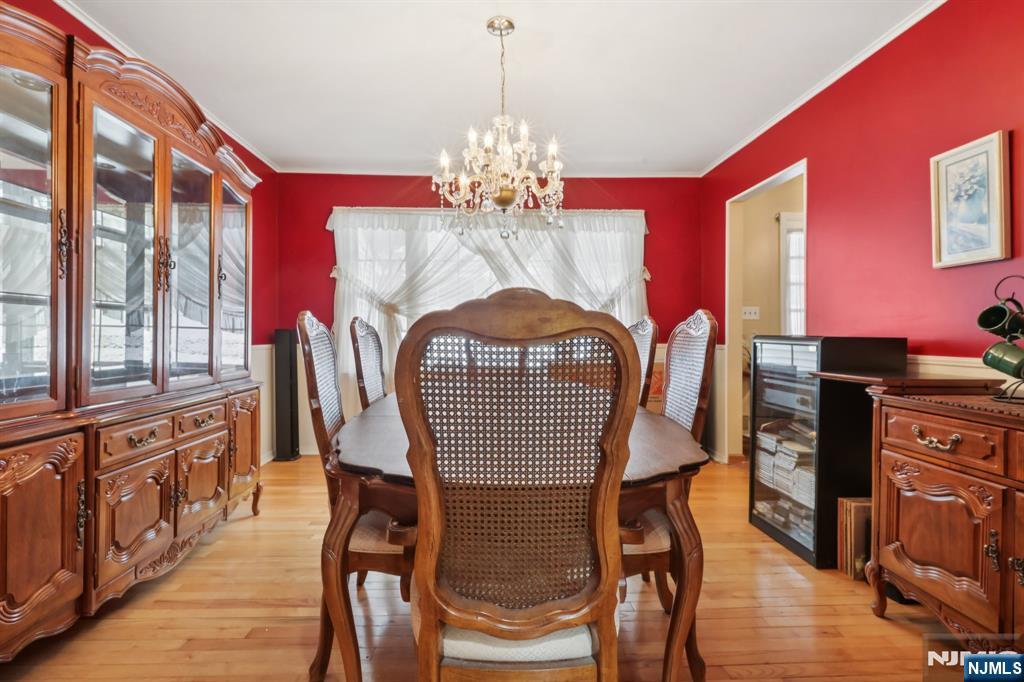29 Joyce Drive Roxbury Township, NJ 07876 - Photo 8 of 31 a view of a dining room with furniture window and wooden floor