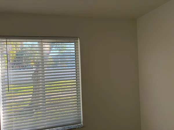 a view of a room with a window