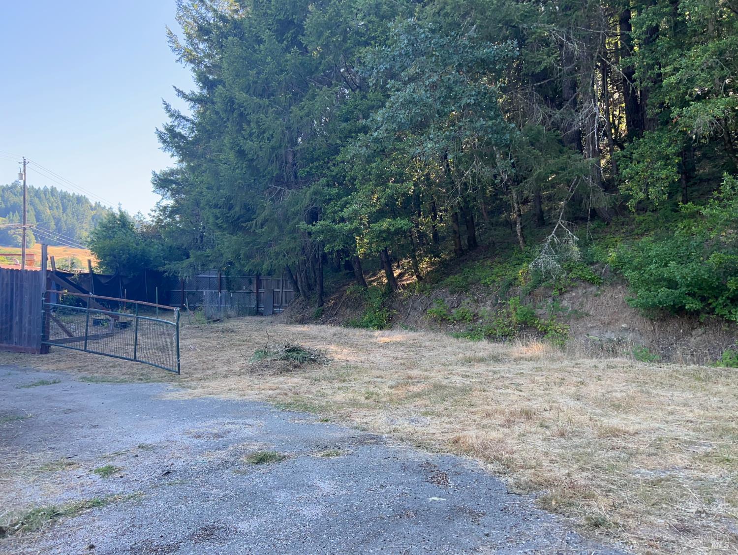 1901 Fort Bragg Road Willits, CA 95490 - Photo 3 of 5 a view of backyard with wooden fence