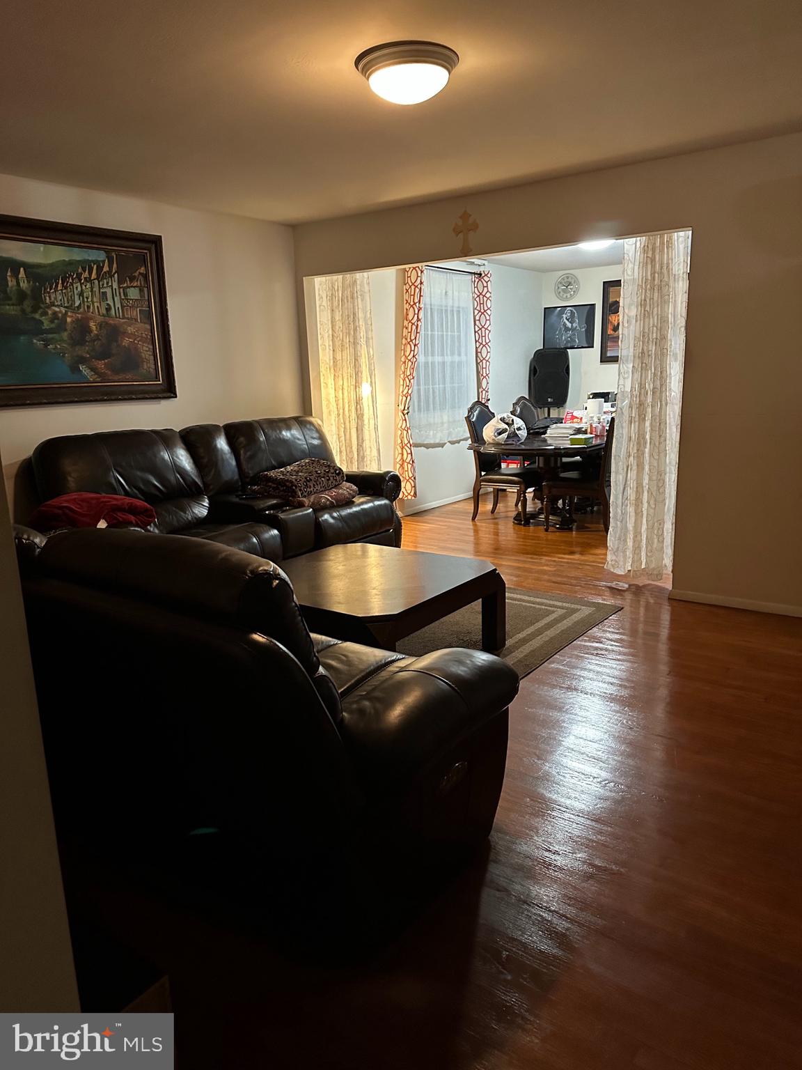 9072 Meadow Heights Road Randallstown, MD 21133 - Photo 4 of 16 a living room with furniture rug and a large window